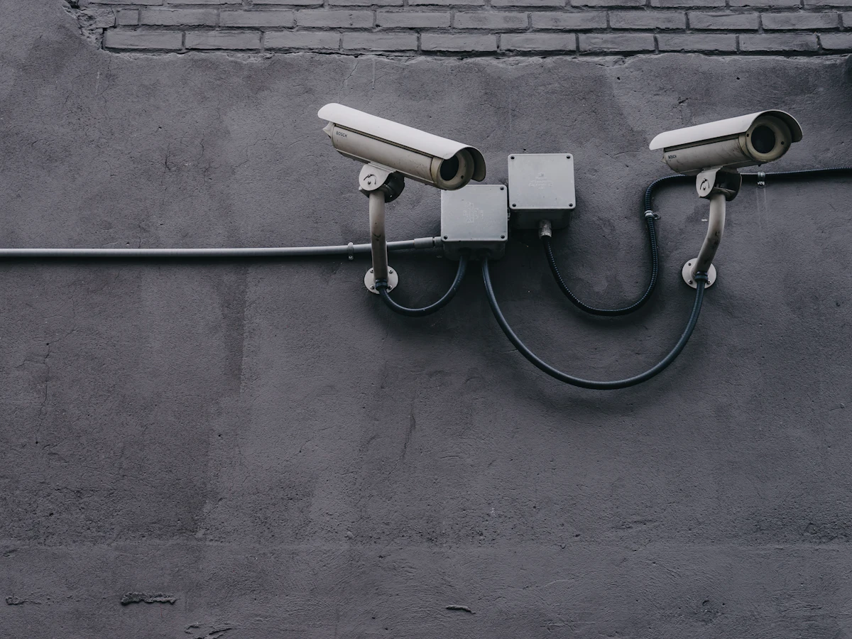 Bullet CCTV cameras mounted on a commercial building wall